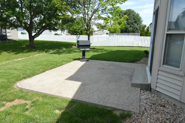 a view of a backyard with a garden