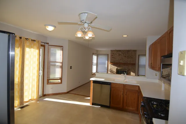 a room with a bed and a chandelier