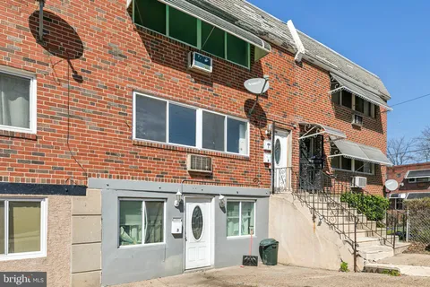 a view of a building with a street