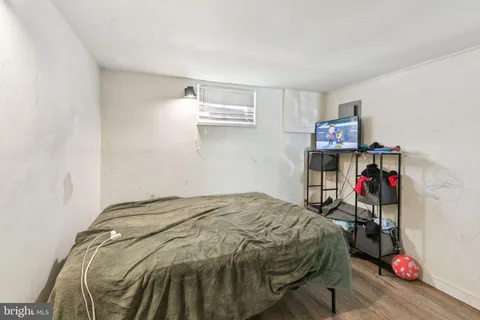a bed room with a bed and a couch