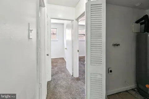 a bathroom with a sink a toilet and bathtub