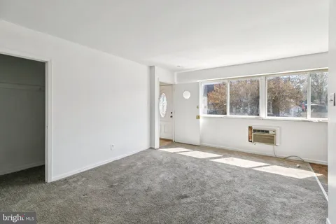 a view of a bathroom from the hallway