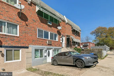 a car parked in front of a building