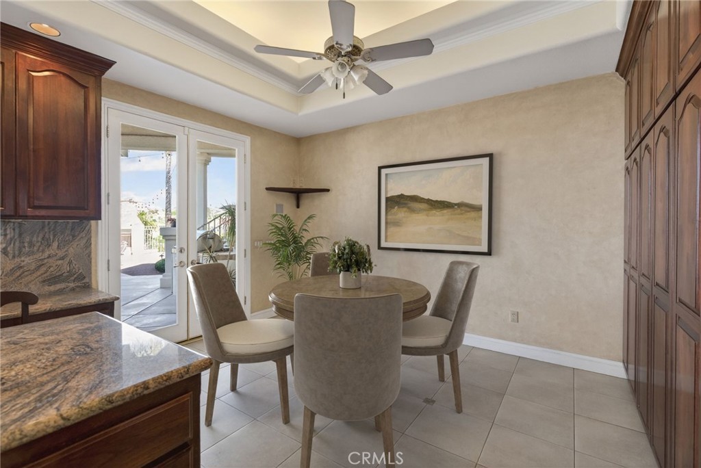 6872 Chartwell Drive Riverside, CA 92506 - Photo 35 of 75 a dining room with furniture and window