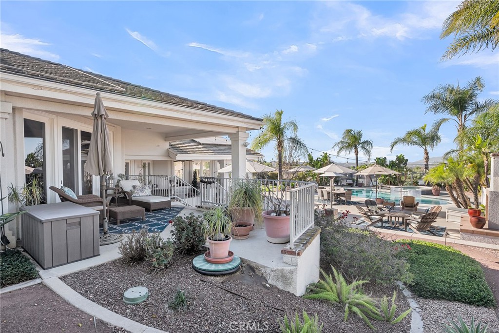 6872 Chartwell Drive Riverside, CA 92506 - Photo 39 of 51 a view of a house with backyard and sitting area