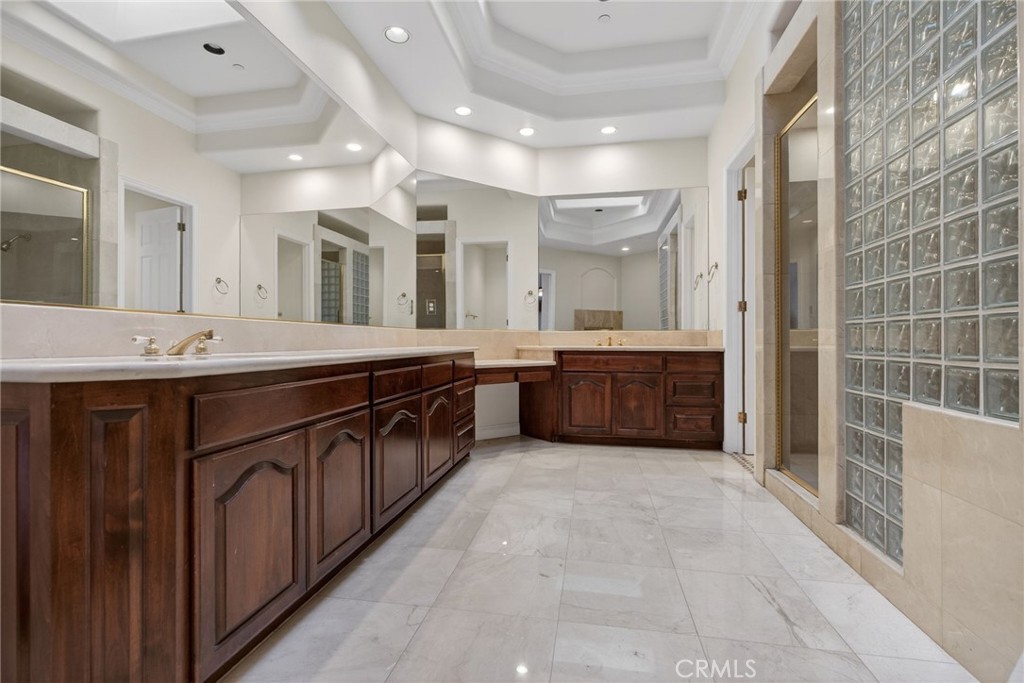 6872 Chartwell Drive Riverside, CA 92506 - Photo 43 of 75 a bathroom with a sink double vanity
