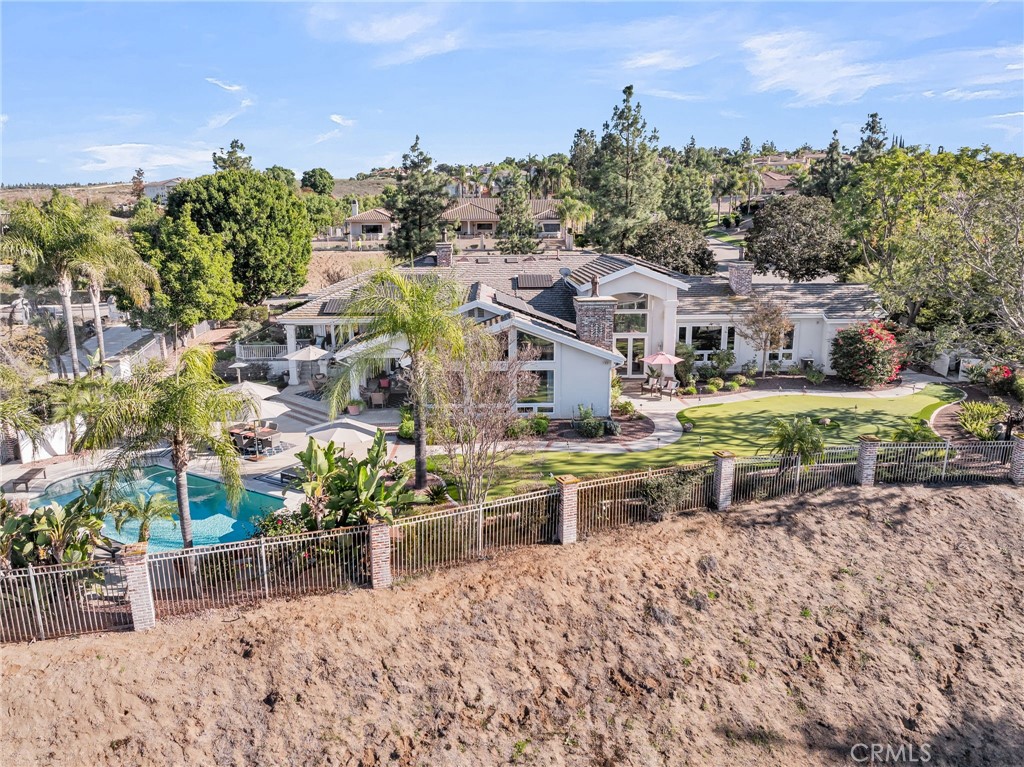 6872 Chartwell Drive Riverside, CA 92506 - Photo 48 of 51 an aerial view of residential houses with outdoor space and trees all around