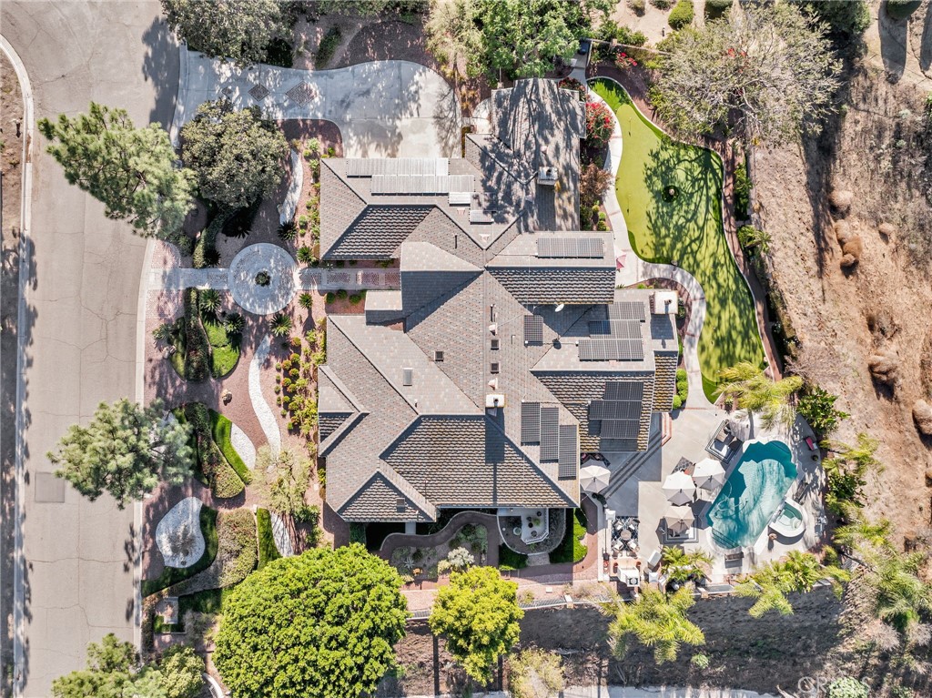 6872 Chartwell Drive Riverside, CA 92506 - Photo 49 of 51 an aerial view of a house with a lot of flower plants