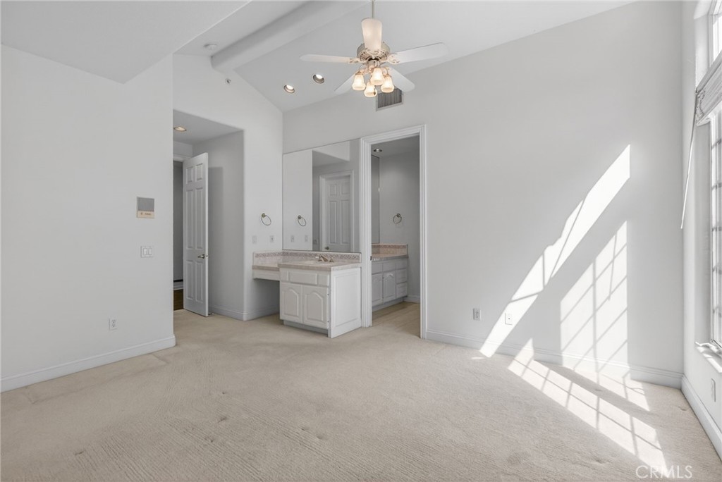 6872 Chartwell Drive Riverside, CA 92506 - Photo 50 of 75 a view of a kitchen with a sink and a window