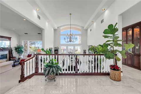 a view of a chairs and table in a room