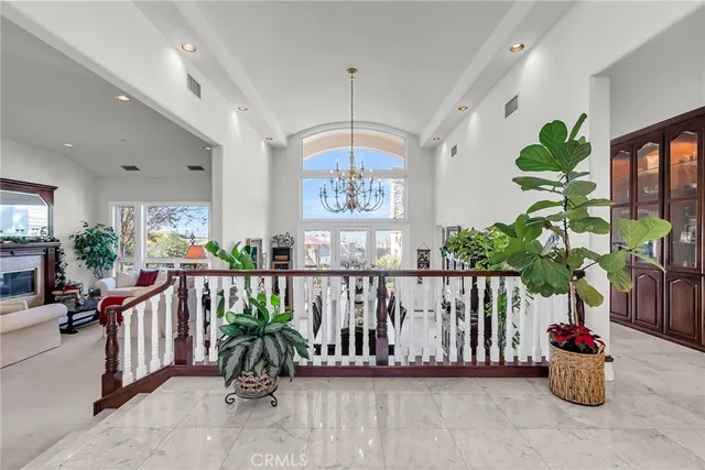 a view of a chairs and table in a room