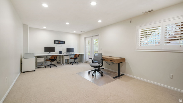 11128 South Barrett Pk Circle Sandy, UT 84092 - Photo 23 of 36 Spacious room featuring neutral carpeting, recessed lighting, and a window with white plantation shutters