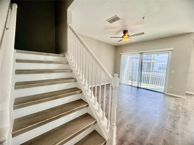 a view of entryway with wooden floor