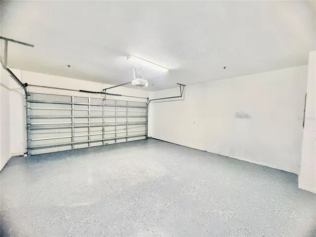 a front view of a residential houses with yard