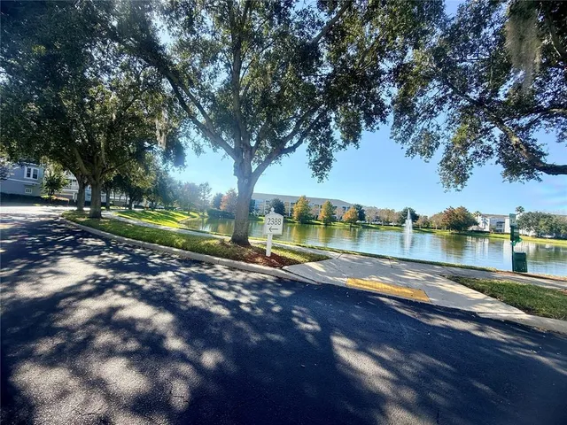a view of a garden with an outdoor seating