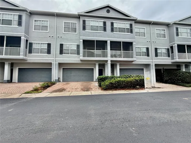 a front view of a building with a road