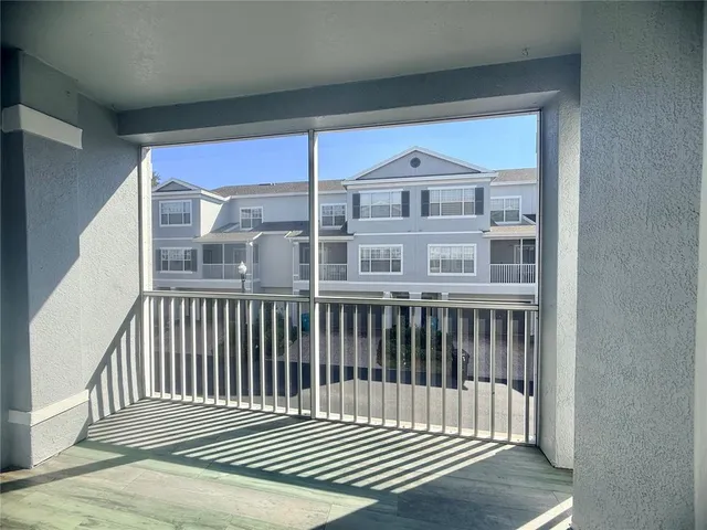 a view of a large building from a balcony