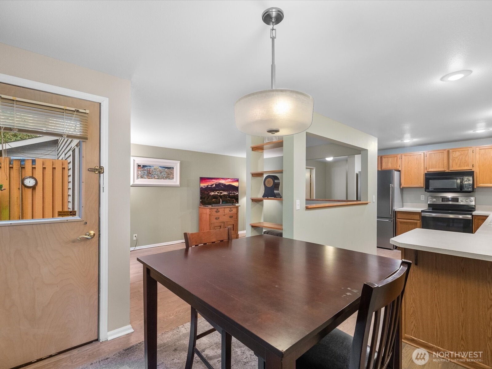 21227 76th Avenue West, Unit B8 Edmonds, WA 98026 - Photo 11 of 29 a view of a dining room with furniture