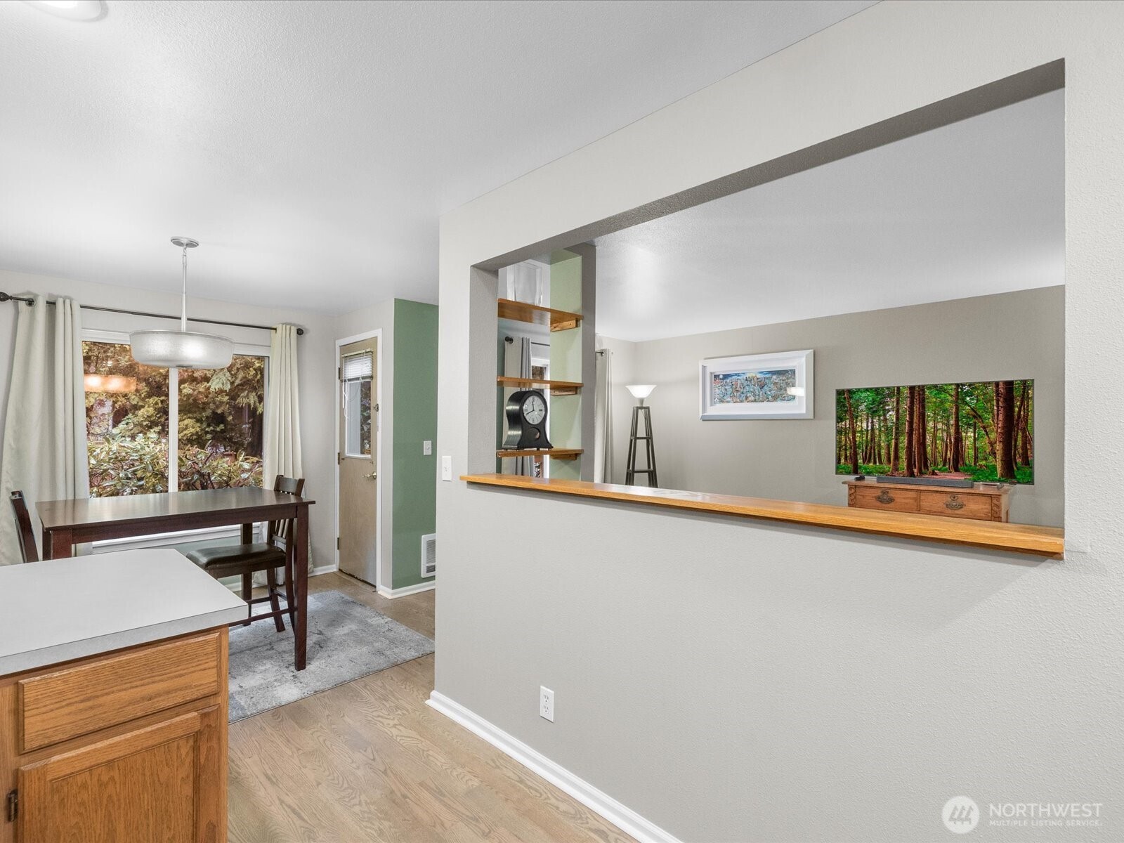 21227 76th Avenue West, Unit B8 Edmonds, WA 98026 - Photo 15 of 29 a living room with furniture and a window