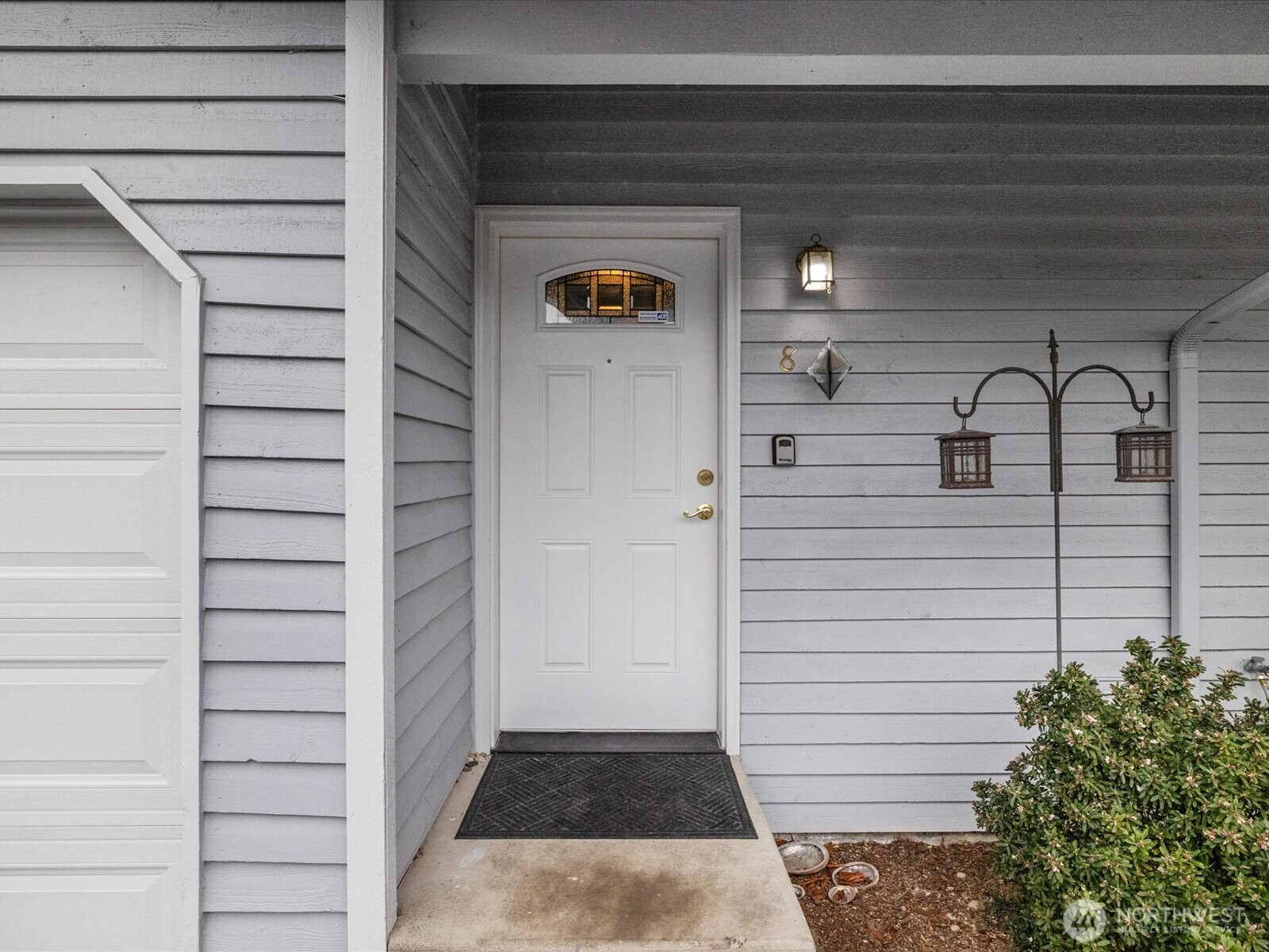 21227 76th Avenue West, Unit B8 Edmonds, WA 98026 - Photo 2 of 29 a view of a door of the house