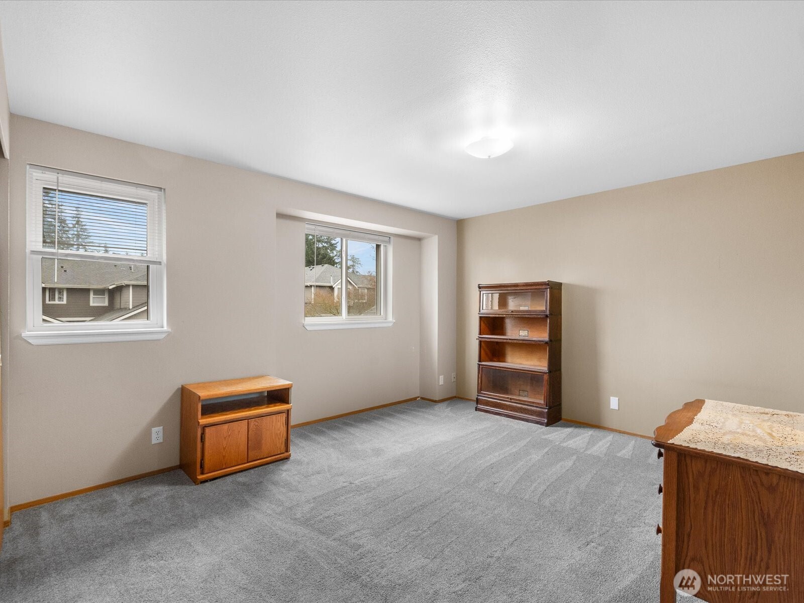 21227 76th Avenue West, Unit B8 Edmonds, WA 98026 - Photo 22 of 29 a view of room with furniture and window