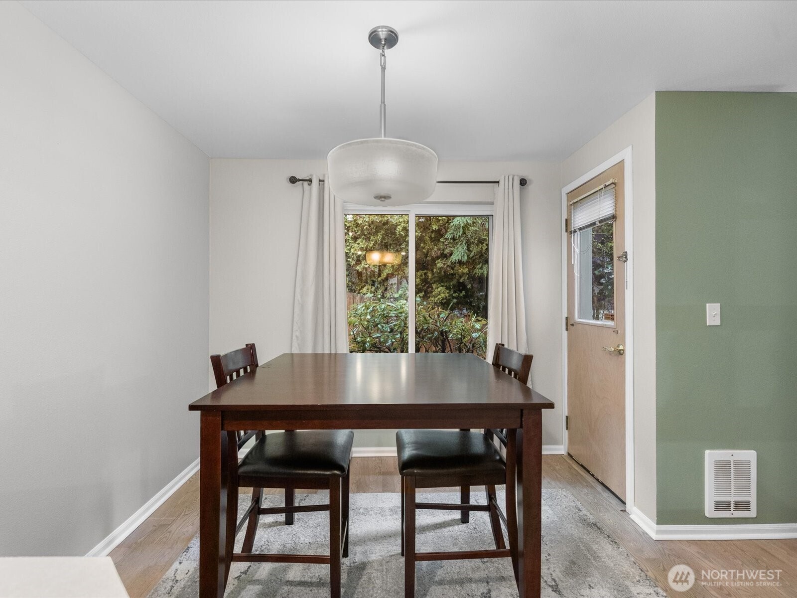 21227 76th Avenue West, Unit B8 Edmonds, WA 98026 - Photo 10 of 29 a dining room with furniture and window