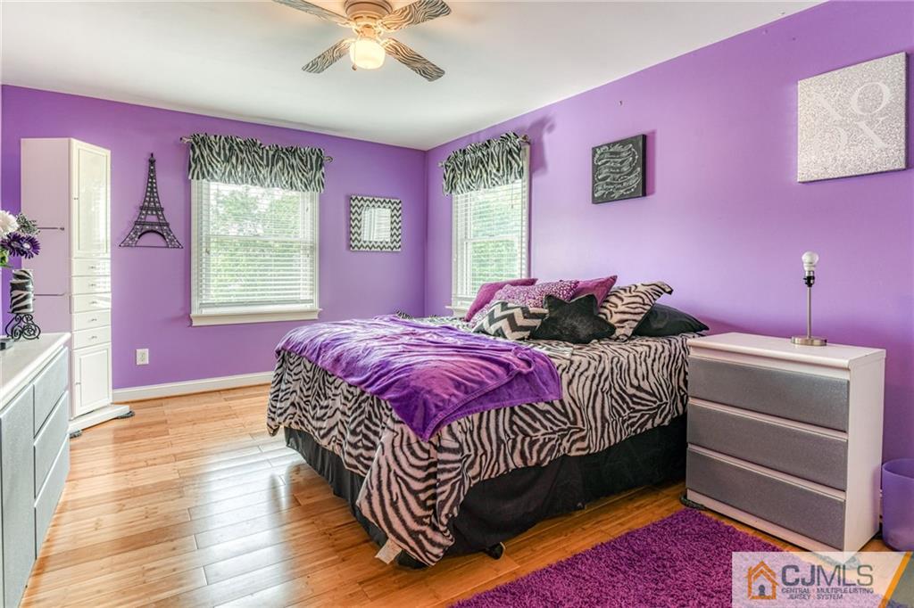 85 Davidson's Mill Road North Brunswick, NJ 08902 - Photo 30 of 39 a bedroom with a bed and a dresser