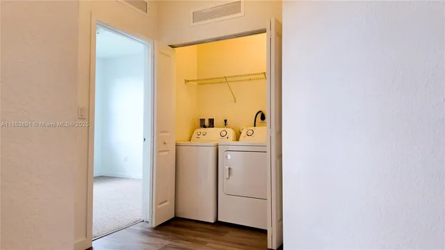 a view of walk in closet with window