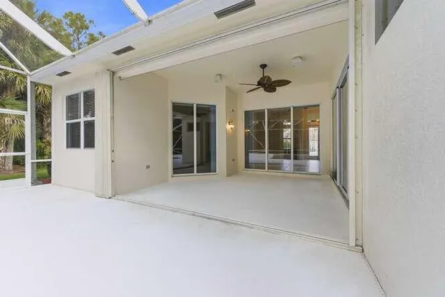 front view of a house with a large window