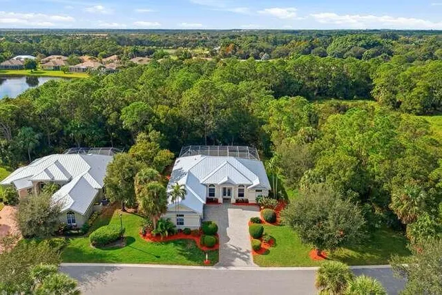 an aerial view of a house with a garden