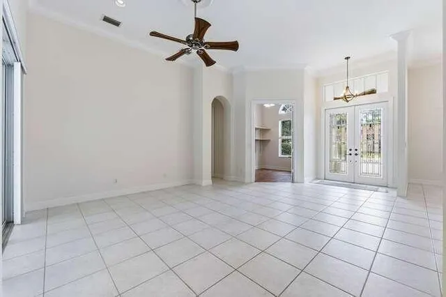 a view of a livingroom with a furniture and chandelier