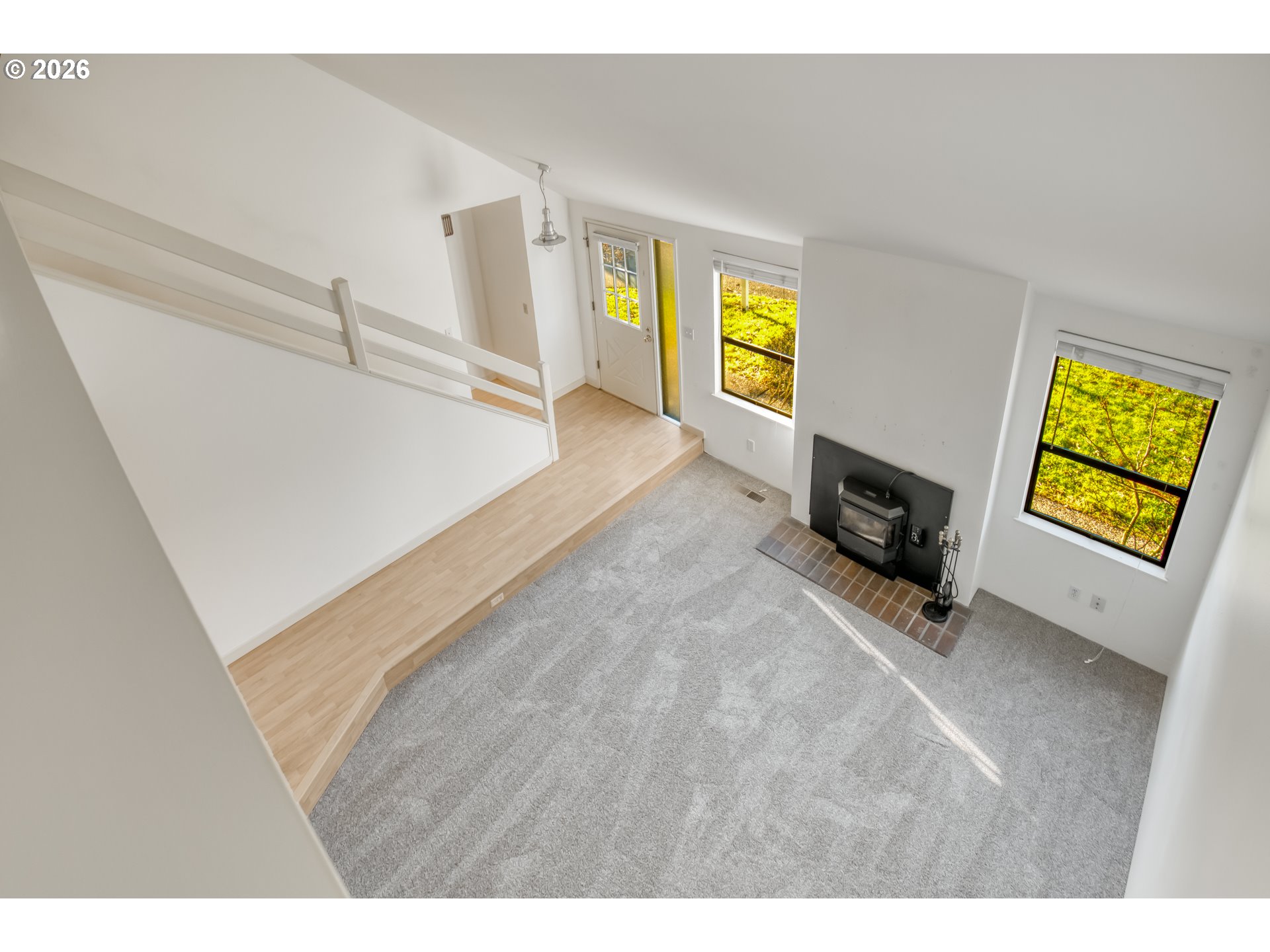 9731 Southwest London Court Portland, OR 97223 - Photo 18 of 27 a view of an empty room and a window