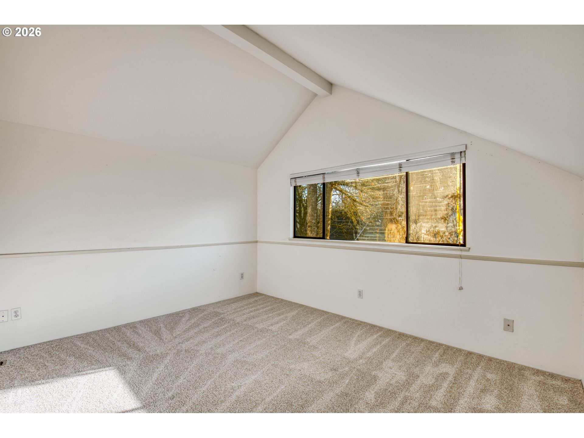 9731 Southwest London Court Portland, OR 97223 - Photo 19 of 27 a view of an empty room with a window