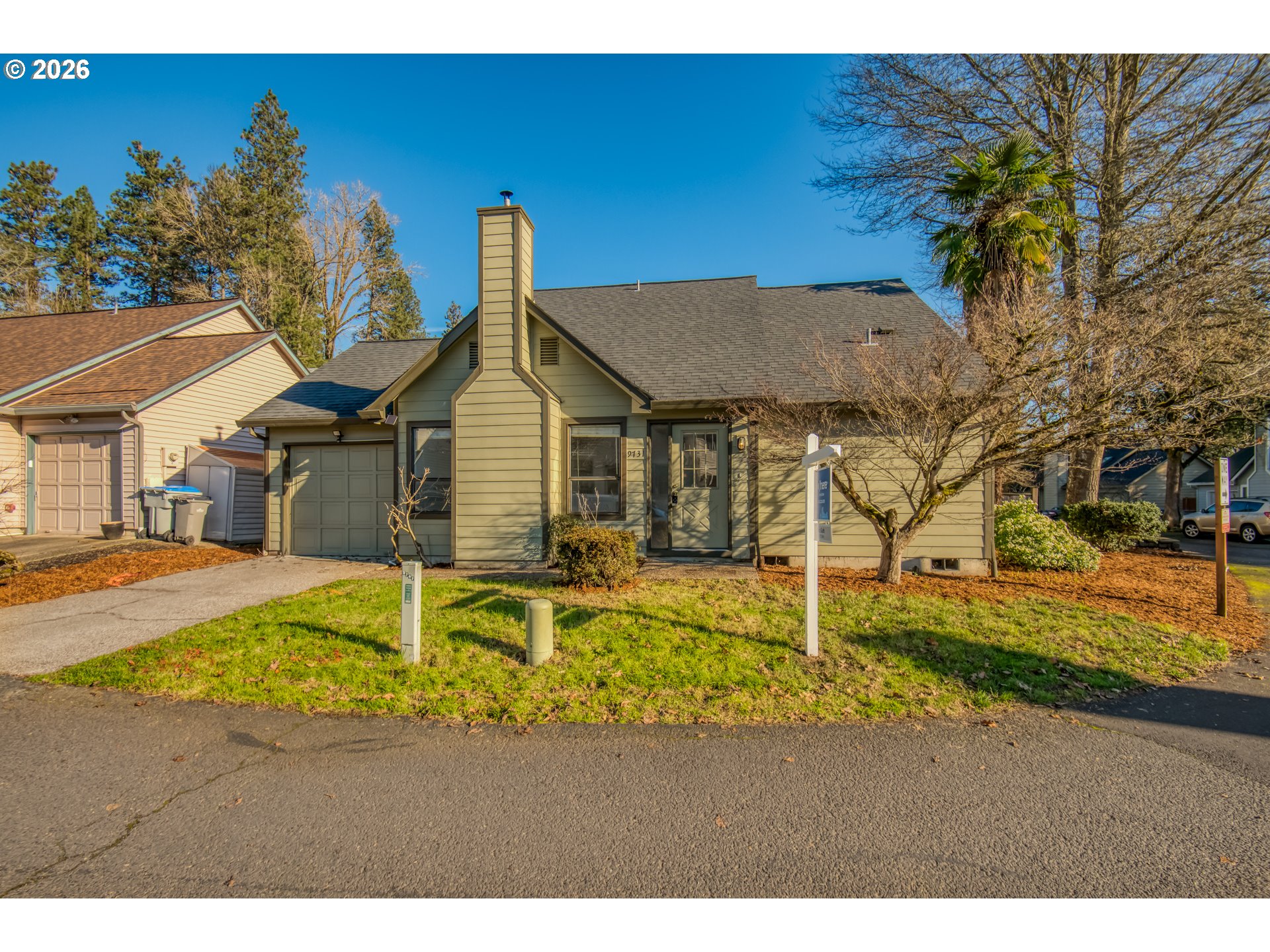 9731 Southwest London Court Portland, OR 97223 - Photo 2 of 27 a aerial view of a house with swimming pool