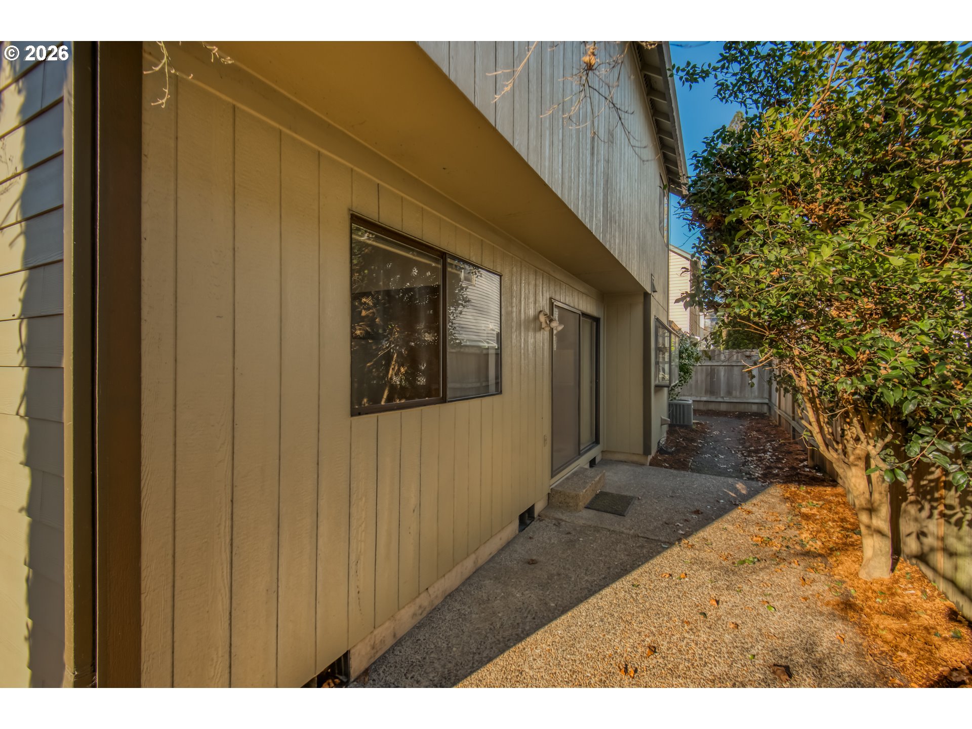 9731 Southwest London Court Portland, OR 97223 - Photo 23 of 27 a view of a house with a porch