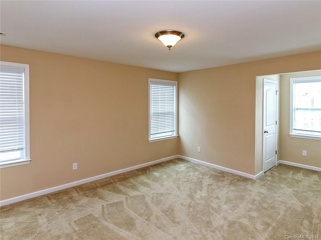 233 Annatto Way, Unit 553 Tega Cay, SC 29708 - Photo 14 of 22 a view of an empty room with a window