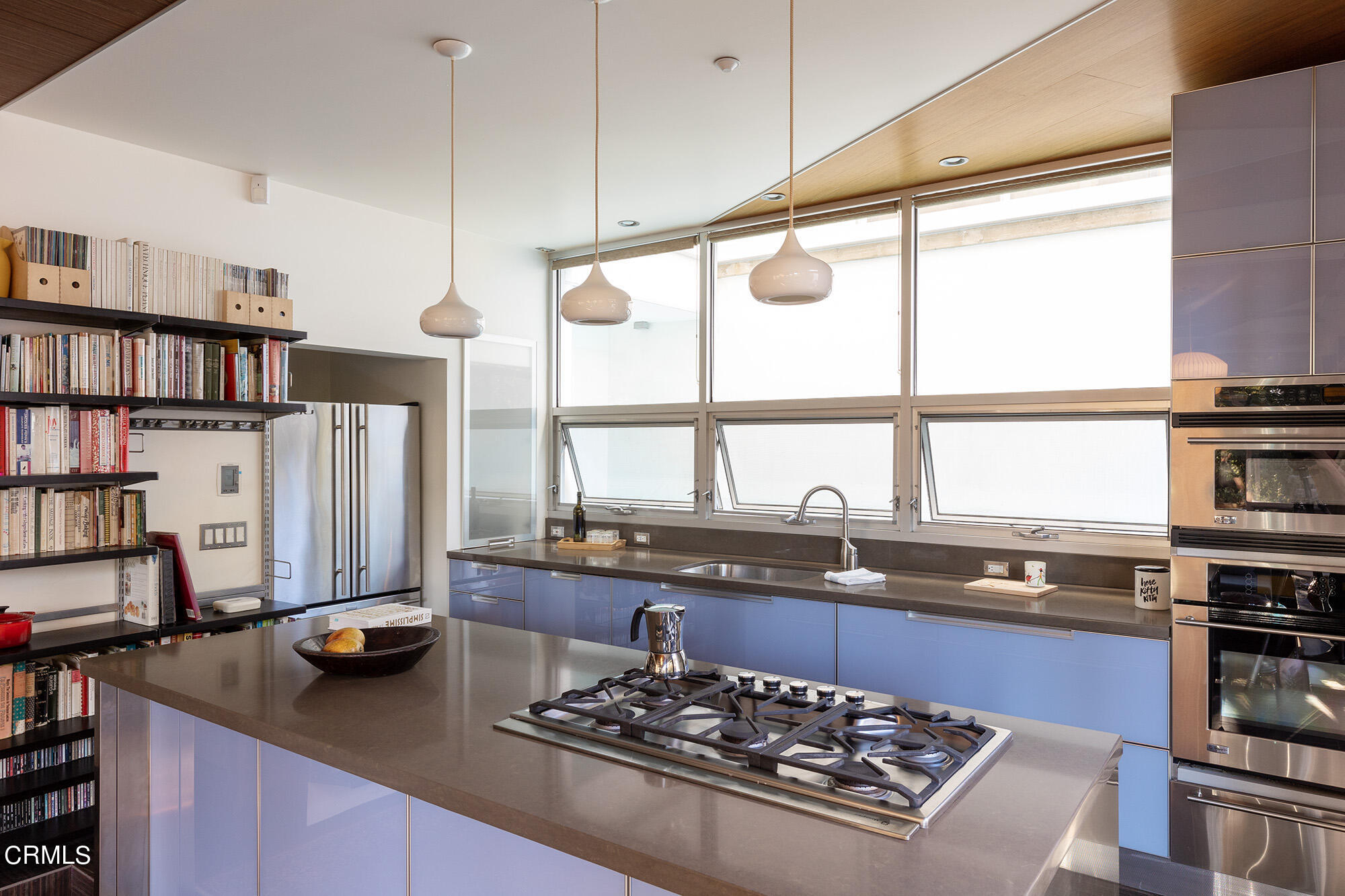 1869 Kaweah Drive Pasadena, CA 91105 - Photo 14 of 36 a kitchen with stainless steel appliances granite countertop a stove and a refrigerator