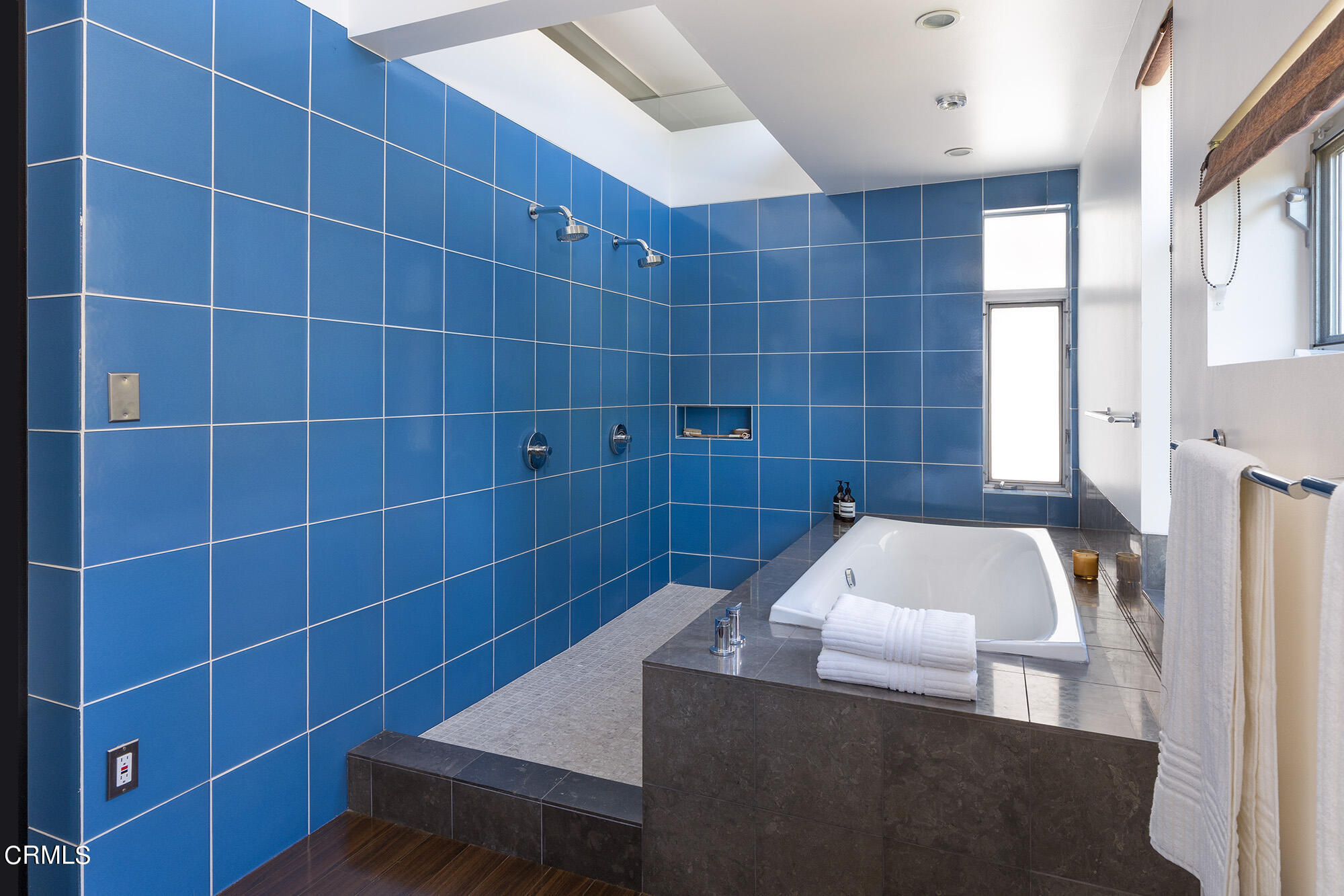 1869 Kaweah Drive Pasadena, CA 91105 - Photo 24 of 36 a bath tub sitting in a bathroom next to a window