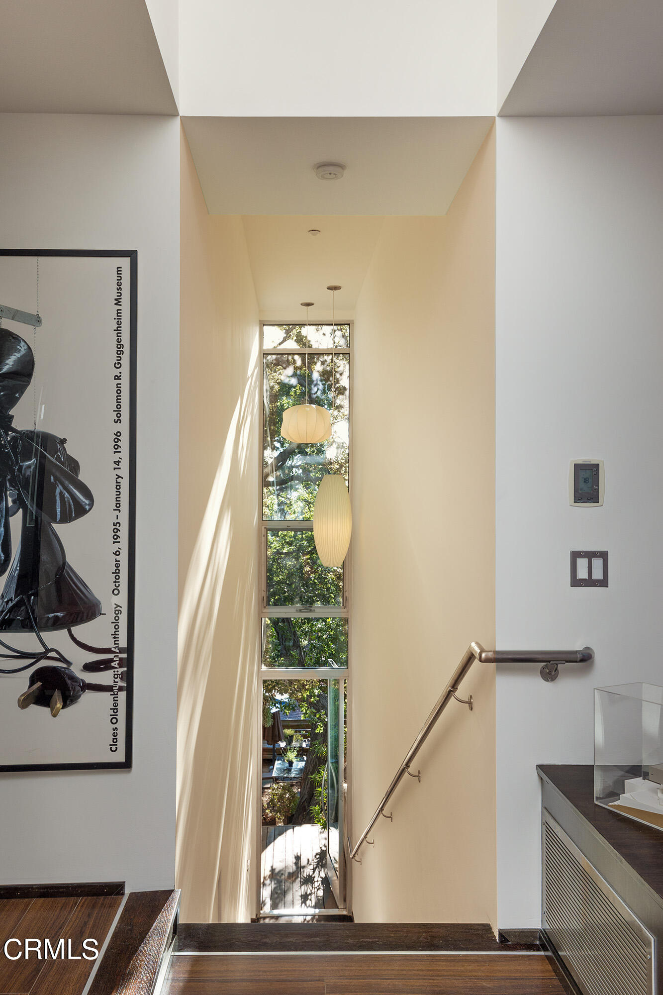 1869 Kaweah Drive Pasadena, CA 91105 - Photo 9 of 36 a view of a hallway with wooden floor and dining room view