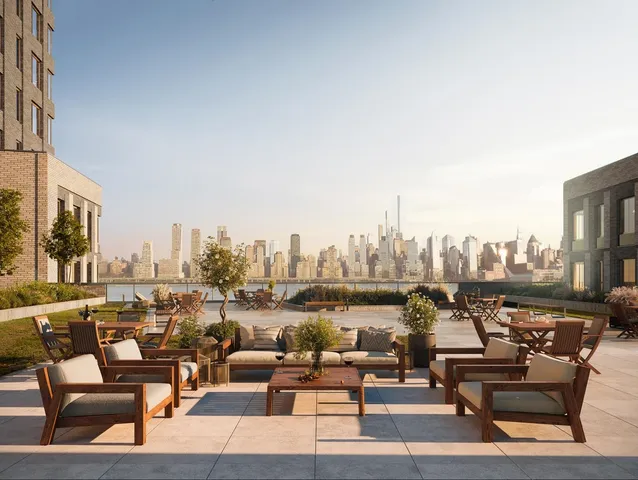 a view of a terrace with sitting area