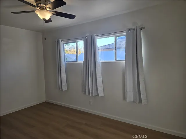 a bathroom with a sink a toilet and vanity