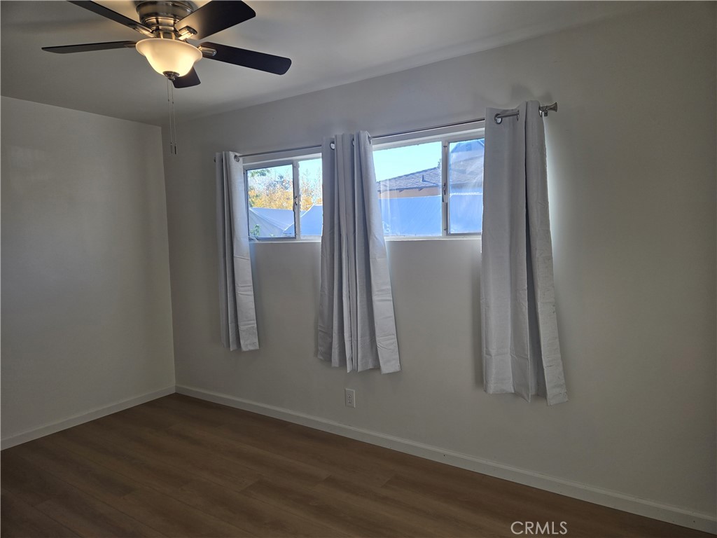 1734 Atchison Street Pasadena, CA 91104 - Photo 14 of 19 an ocean view with wooden floor and cabinet