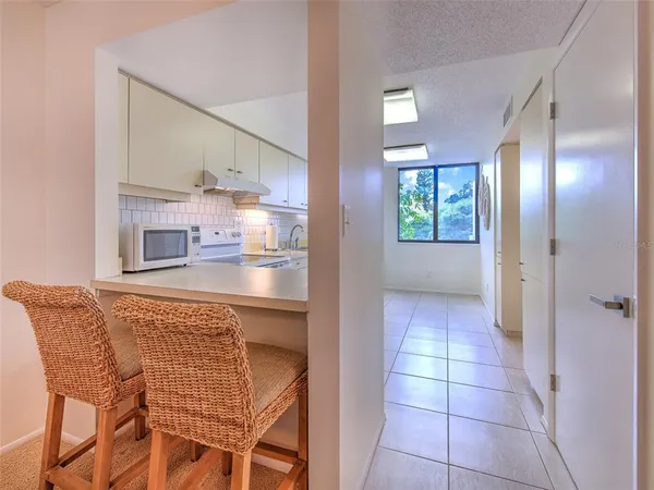 a bedroom with a bed and a table