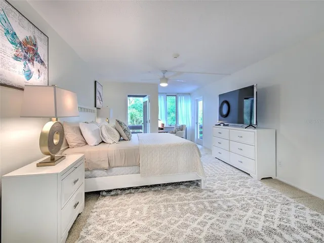 a work room with furniture and a window