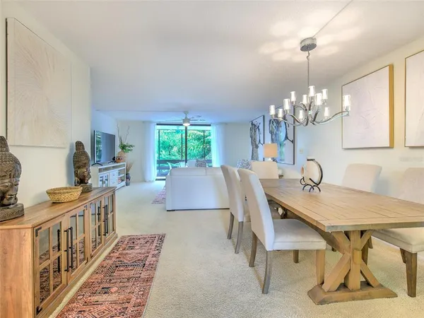 a view of a dining room with furniture