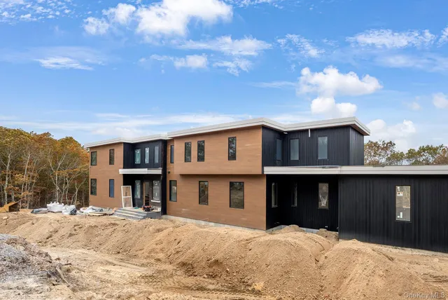 a house view with a outdoor space