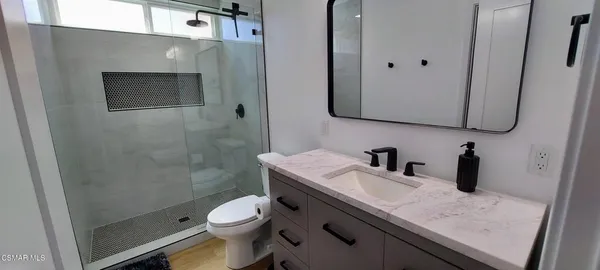 a view of an empty walk in closet