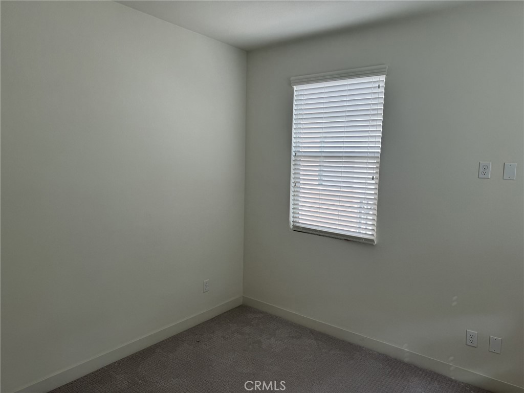 233 Radial Irvine, CA 92618 - Photo 19 of 27 an empty room with a window