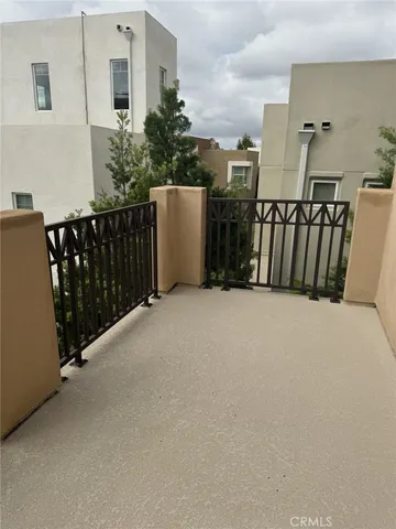 a view of balcony with furniture