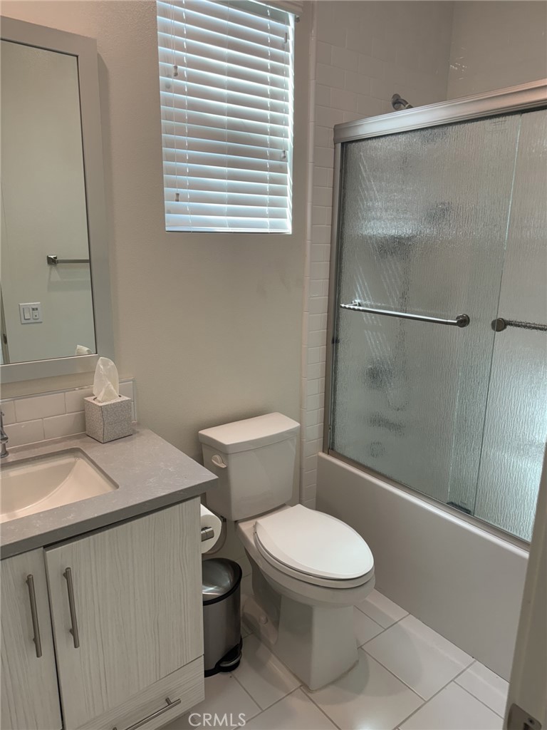 233 Radial Irvine, CA 92618 - Photo 7 of 27 a white toilet sitting next to a bathroom sink